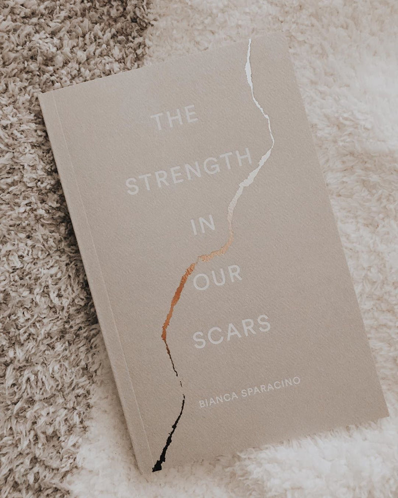 The Strength In Our Scars • Book